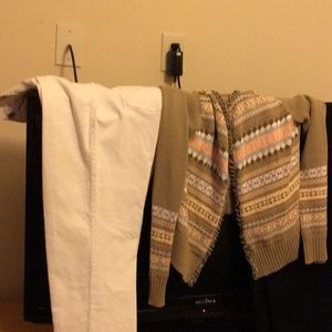 White pants. Sweater black dress pants